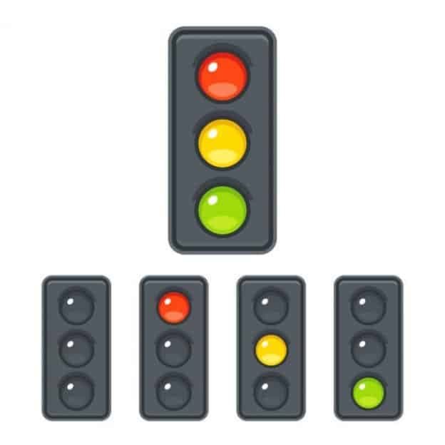 A traffic signal showing red yellow and green lights